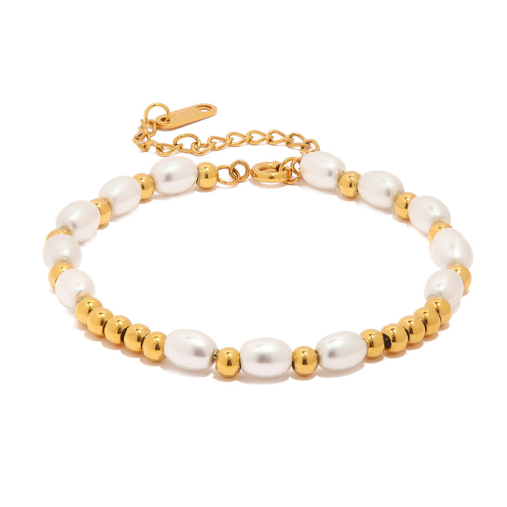 Damen Armband aus Perlen und goldenem Edelstahl Shop Nory