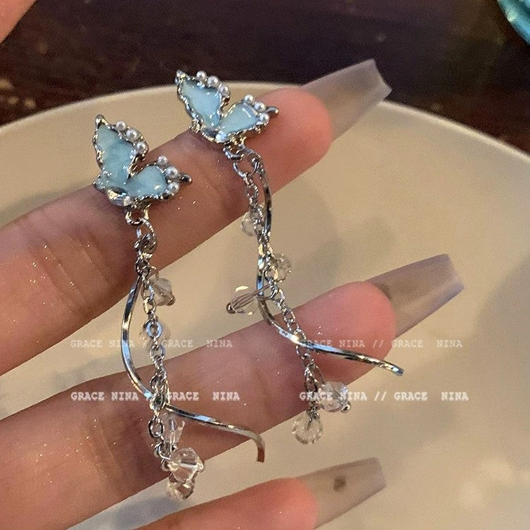 Damen Ohrringe mit filigranem Schmetterlingsdesign und funkelnden Ziersteinen Shop Nory