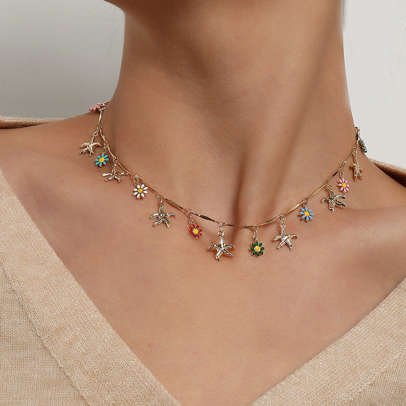 Damen Halskette mit farbenfrohen Blumen- und Vogelanhängern Shop Nory