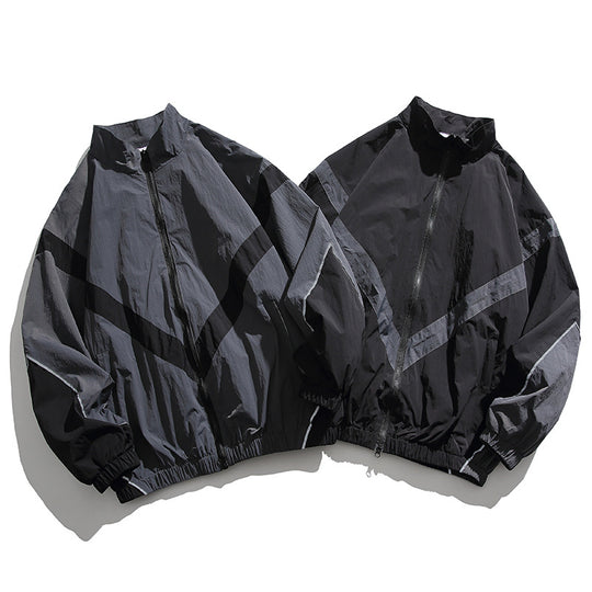 [Unisex] Oversize technische Wind- und Regenjacke mit Stehkragen, reflektierenden Paspeln und elastischem Saum Shop Nory