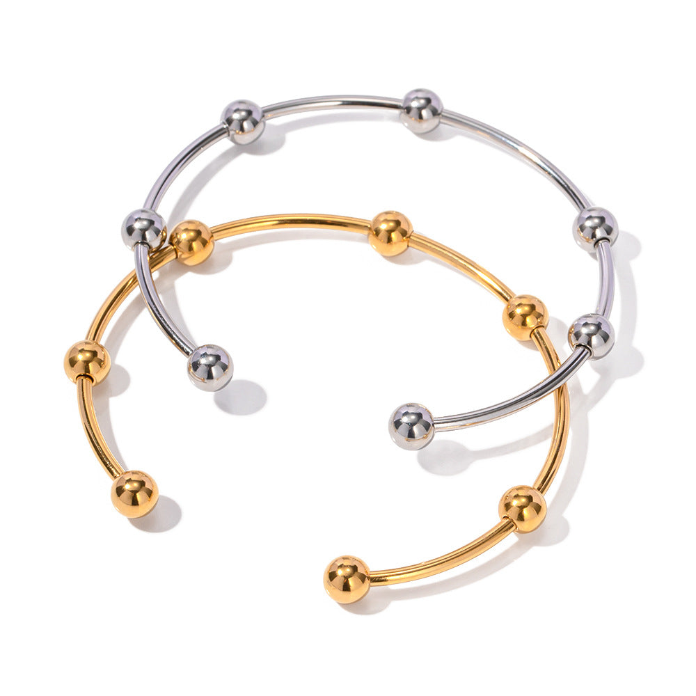 Damen Armreif mit elegantem Kugeldesign aus hypoallergenem Edelstahl Shop Nory