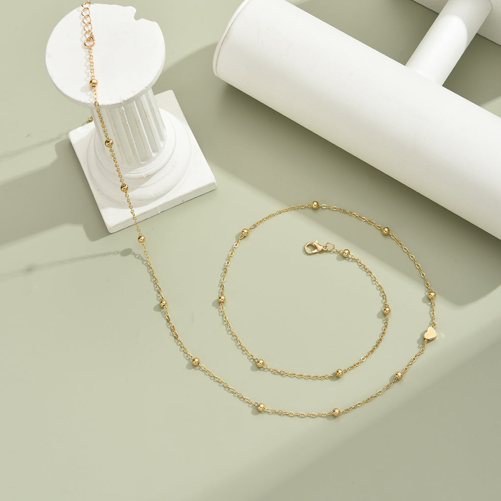 Damen Fußkette mit filigranem Herz-Design und funkelnden Akzenten Shop Nory