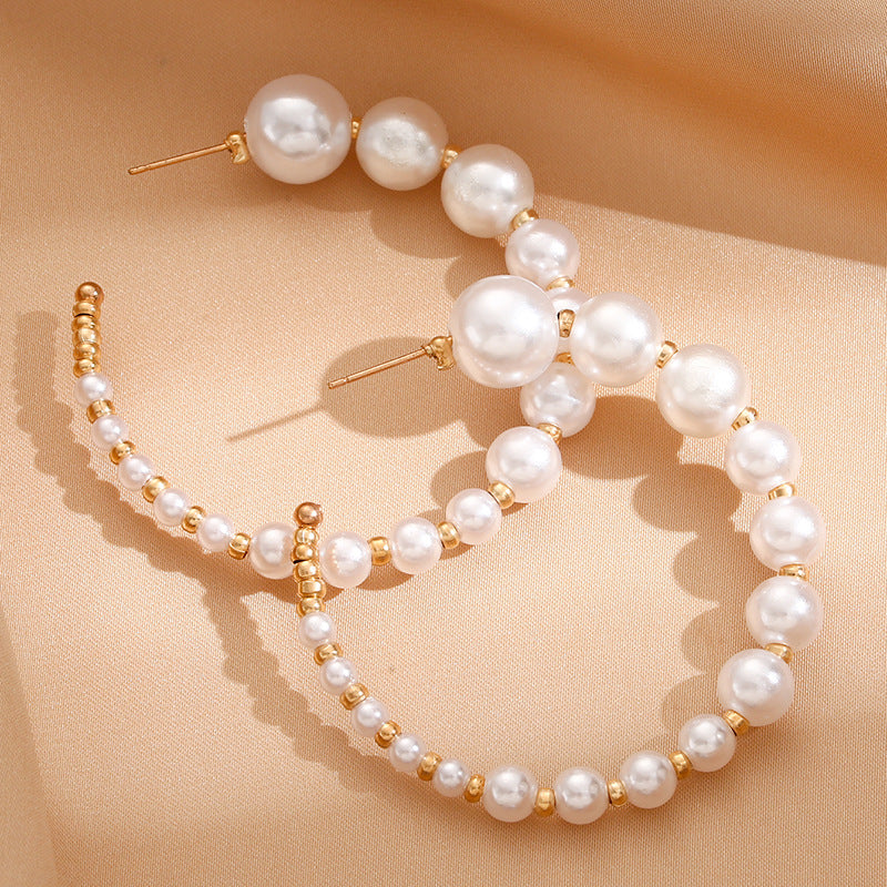 Damen Creolen mit luxuriösen Perlen und goldenen Akzenten Shop Nory