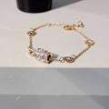 Damen Elegante Armkette mit funkelnden Zirkonia und modernem Design Shop Nory