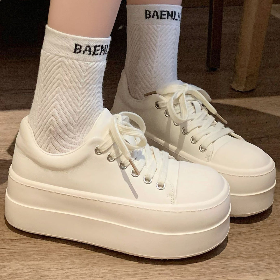 Damen Retro Plateausneaker mit zweifarbiger Lederoptik und extrahoher Gummiplattform Shop Nory