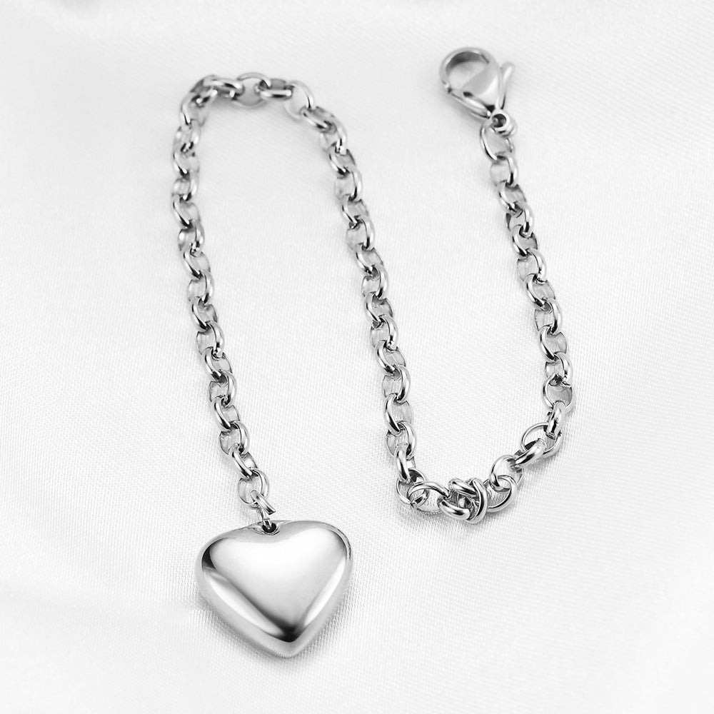 Damen Armband mit herzförmigem Charm aus hochwertigem Edelstahl Shop Nory