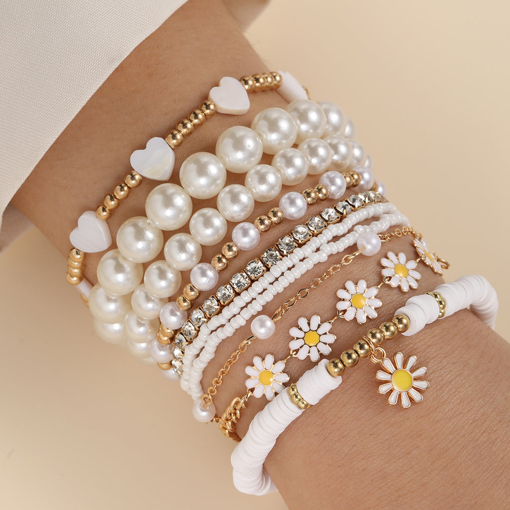 Damen Armband-Set mit stilvollen Perlen und bunten Blumenanhängern Shop Nory