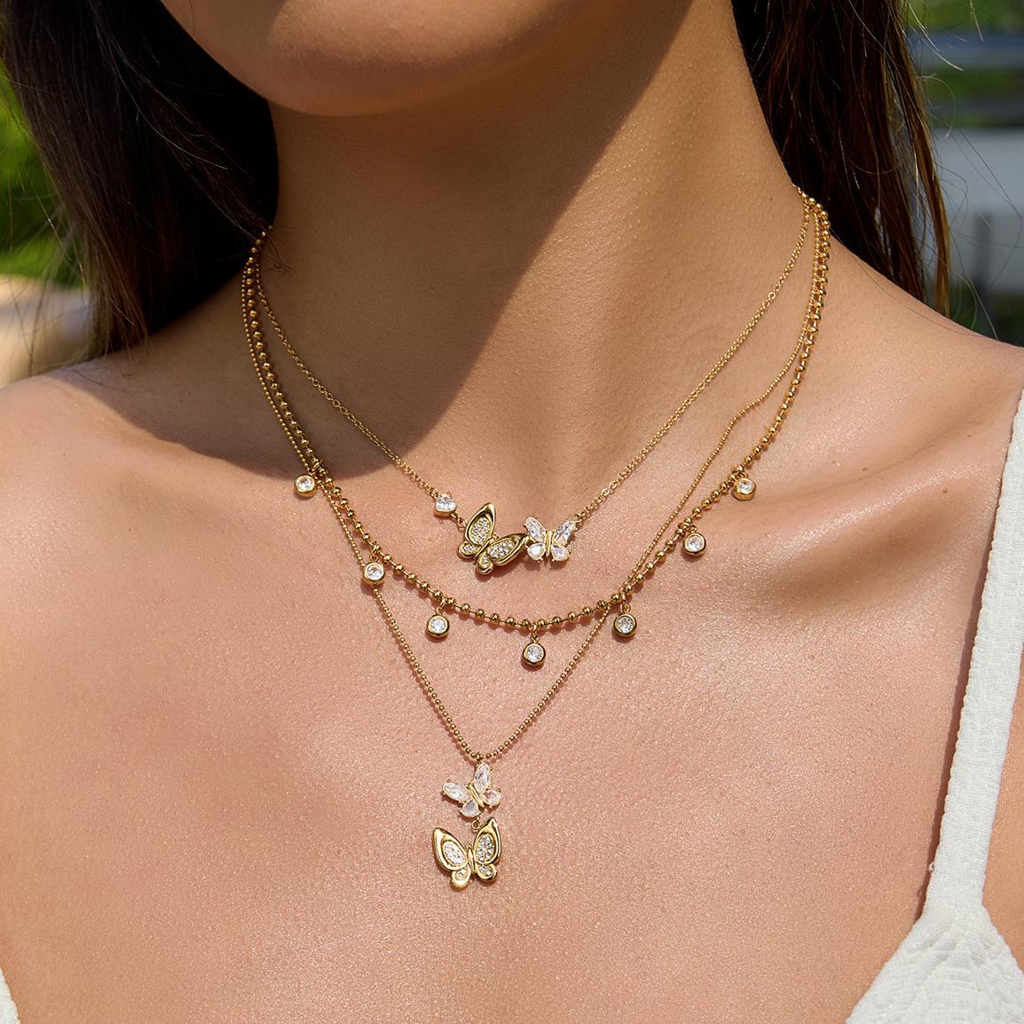 Damen Halskette mit filigranem Schmetterlingsanhänger aus hypoallergenem Edelstahl Shop Nory