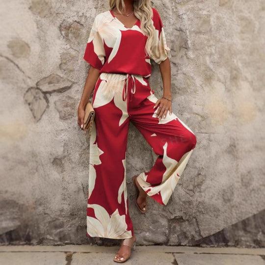 Damen Eleganter Jumpsuit mit floralen Mustern und weitem Bein