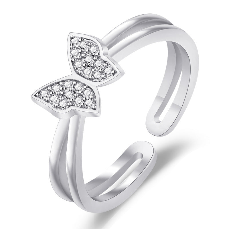 Damenring mit filigranem Schmetterlingsdesign und funkelnden Zirkonia Shop Nory