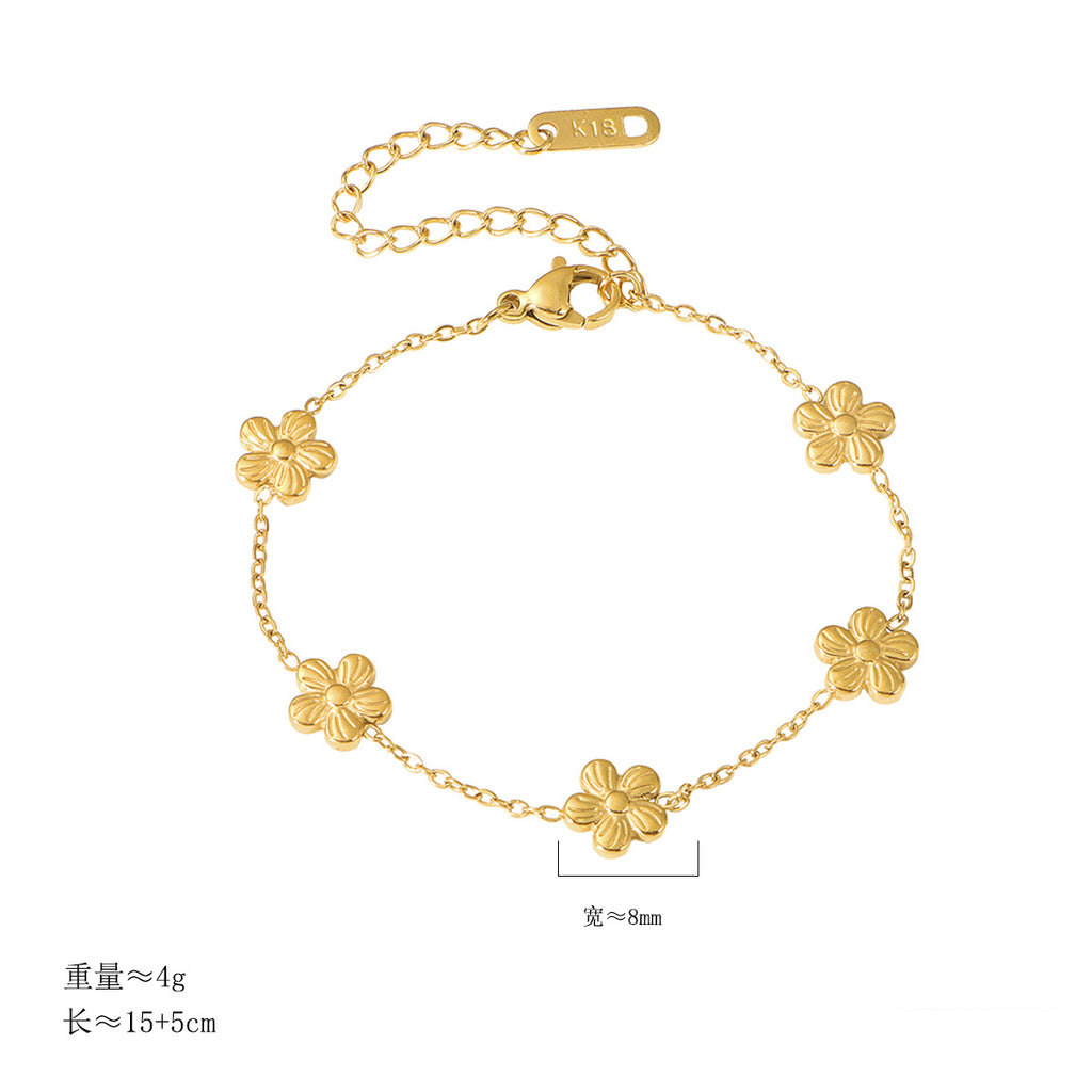 Damen zierliches Armband mit floralen Anhängern Shop Nory