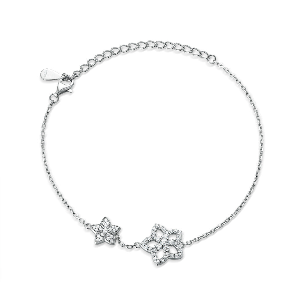 Damenarmband mit funkelndem Zirkonia und modernem Wellenmuster Shop Nory
