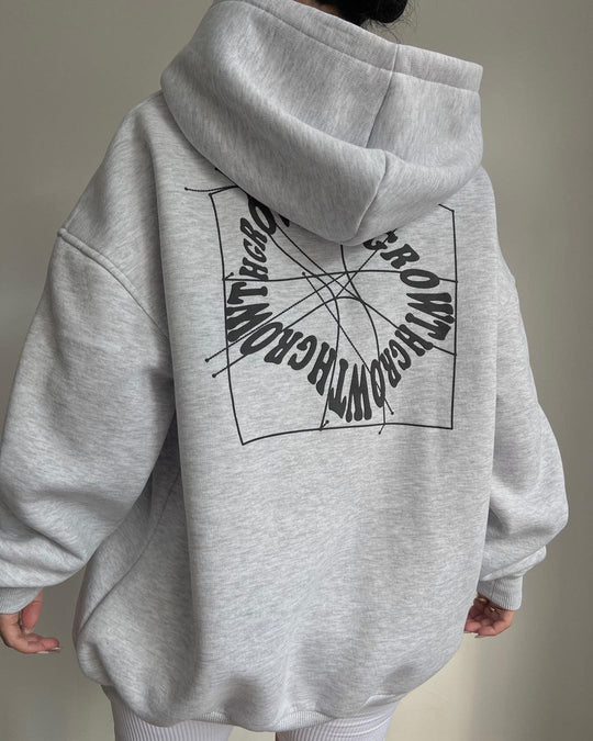 Damen Oversized Kapuzenpullover mit abstraktem Rückenprint und gerippten Bündchen Shop Nory