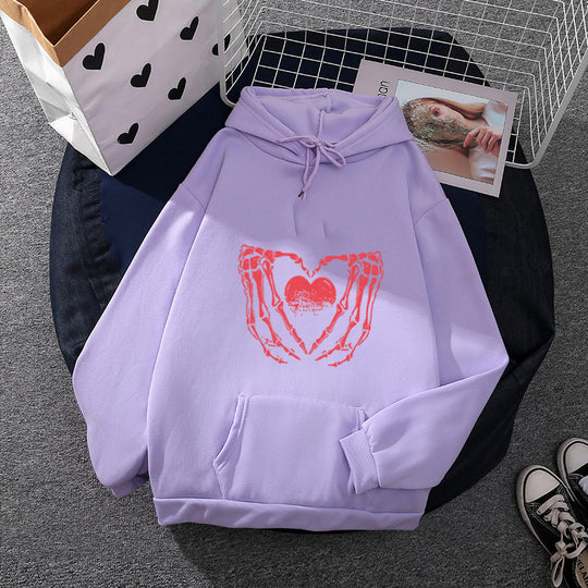 Damen nan stylischer Kapuzenpullover mit Skeletthand Herzmotiv und Kängurutasche Shop Nory