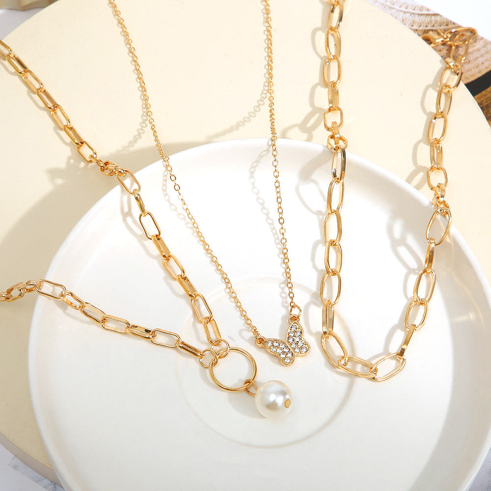 Damen Halskette mit mehrlagigen Designs und filigranen Anhängern Shop Nory