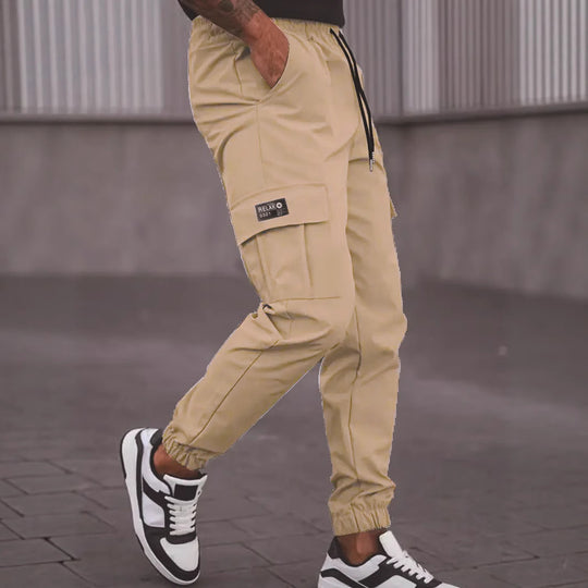 Herren Utility-Cargohose im Joggerstil mit Tunnelzugbund elastischen Beinabschlüssen und Multifachtaschen Shop Nory