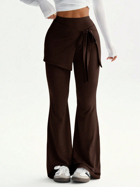 Damen hochtaillierte Schlaghose mit Wickelrock-Overlay und Taillenschleife Shop Nory