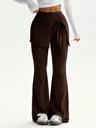 Damen hochtaillierte Schlaghose mit Wickelrock-Overlay und Taillenschleife Shop Nory