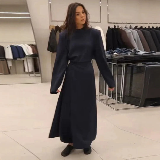Damen Maxikleid mit taillierter Silhouette, ausgestelltem Rock und markanten Schultern Shop Nory