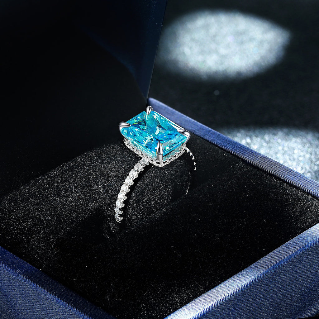 Damen eleganter Ring mit tropfenförmigem Aquamarin und funkelndem Zirkonia-Besatz Shop Nory