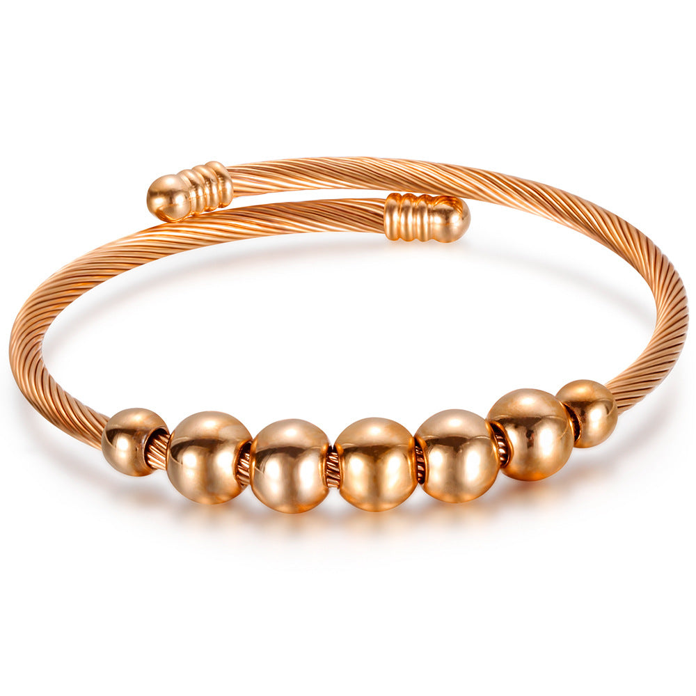 Damen Armreif mit elegantem, geschwungenem Drahtdesign und glänzenden Metallakzenten Shop Nory