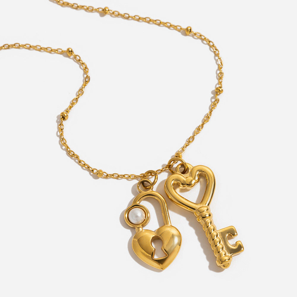 Damen Halskette mit herzförmigem und Schlüssel-Anhänger aus hypoallergenem Edelstahl Shop Nory