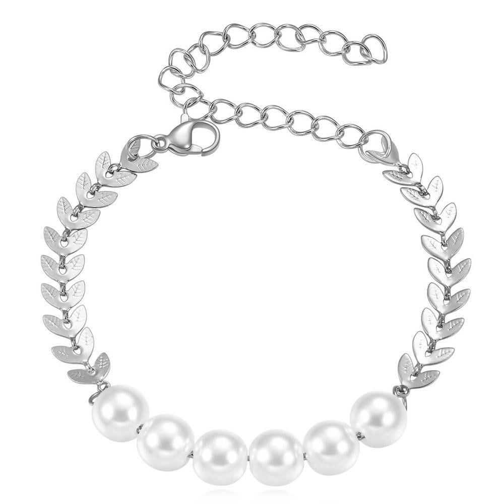Damen Armreif mit elegantem Blattdesign und funkelnden Perlendetails Shop Nory