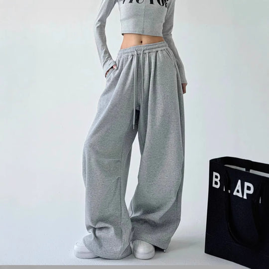 Damen weit geschnittene High-Waist Loungehose mit elastischem Bund, Tunnelzug und seitlichen Eingrifftaschen Shop Nory