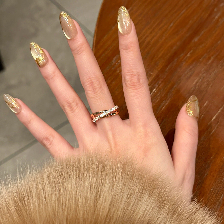 Damenring im eleganten Wickeldesign mit funkelnden Zirkonia Shop Nory