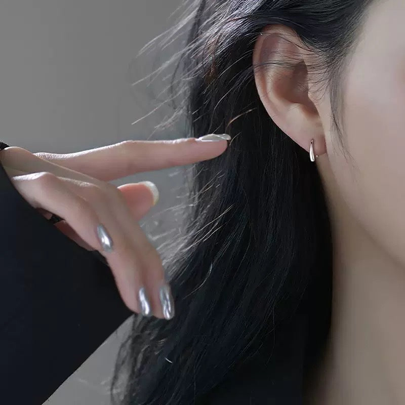 Damen Ohrhänger mit skulpturalem Design und filigraner Verarbeitung Shop Nory