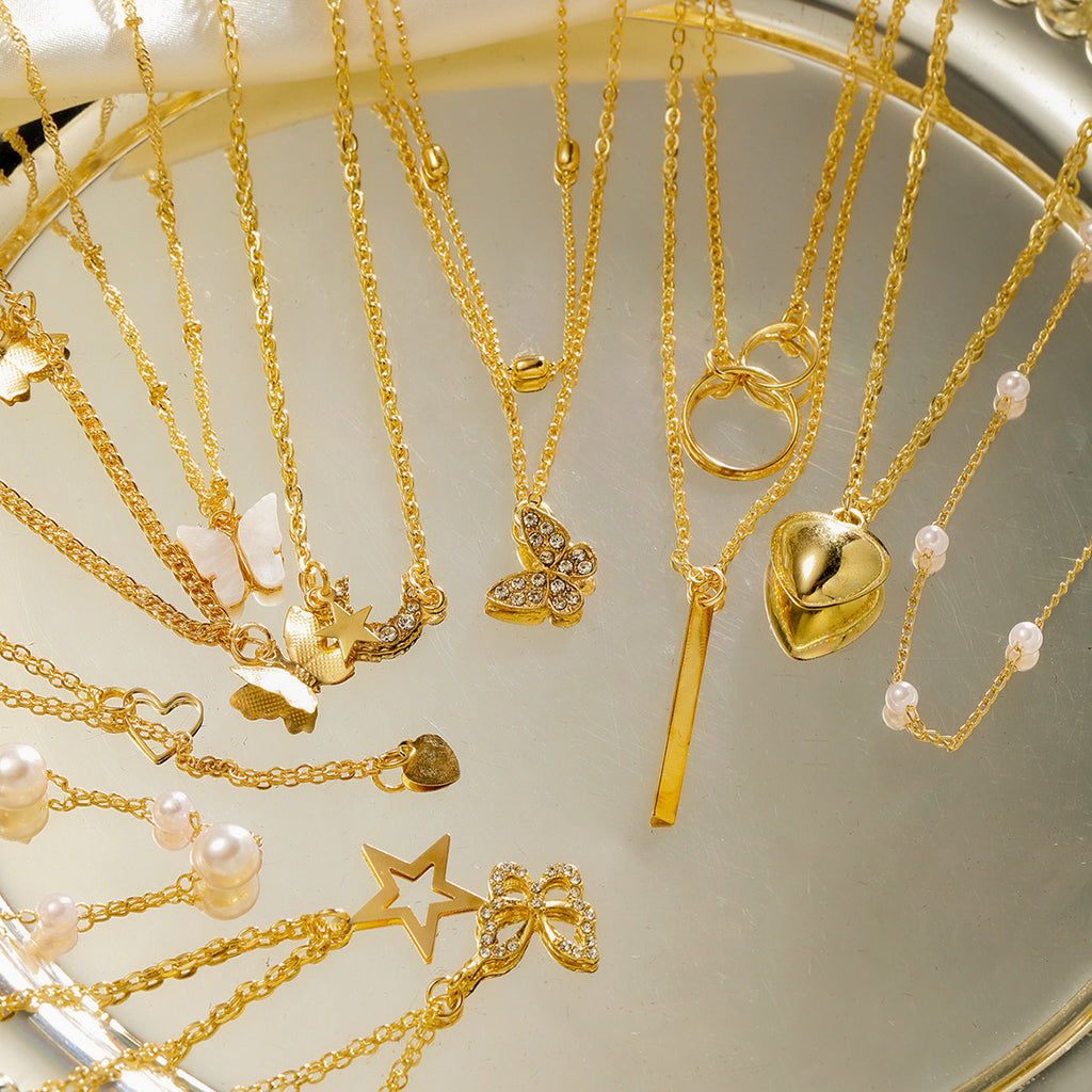 Damen Halsketten-Set mit einzigartigen Anhängern und filigranen Details Shop Nory