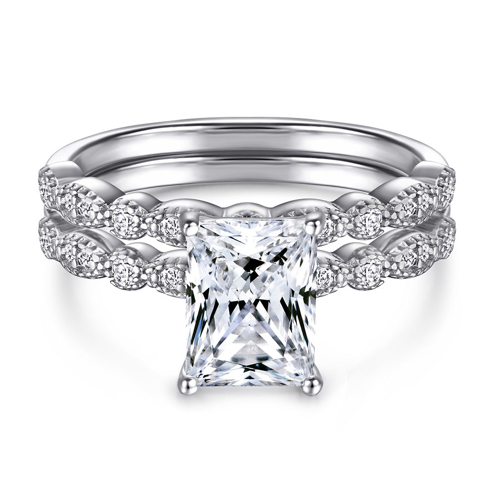 Damenring mit tropfenförmigem Hauptstein und eleganter Zirkonia-Verzierung Shop Nory