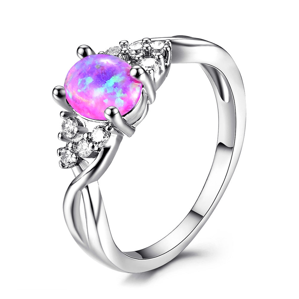 Damen Ring mit schimmerndem Opal und Zirkonia-Verzierungen Shop Nory