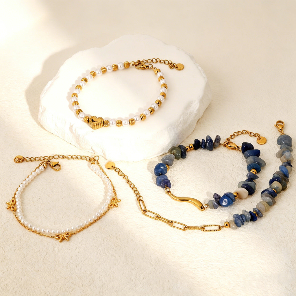Damen Armband mit Herz-Anhänger und luxuriösen Perlen-Design Shop Nory