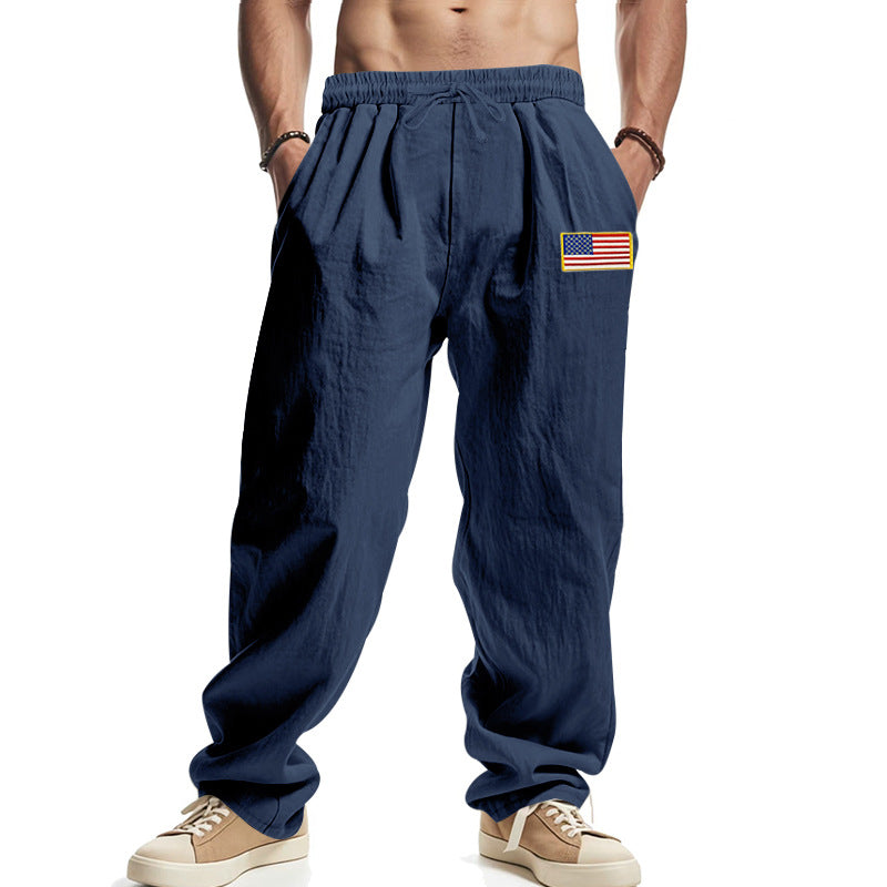 Herren Locker sitzende Freizeit-Hose im Leinen-Look mit elastischem Bund, Kordelzug & Flaggenpatch Shop Nory
