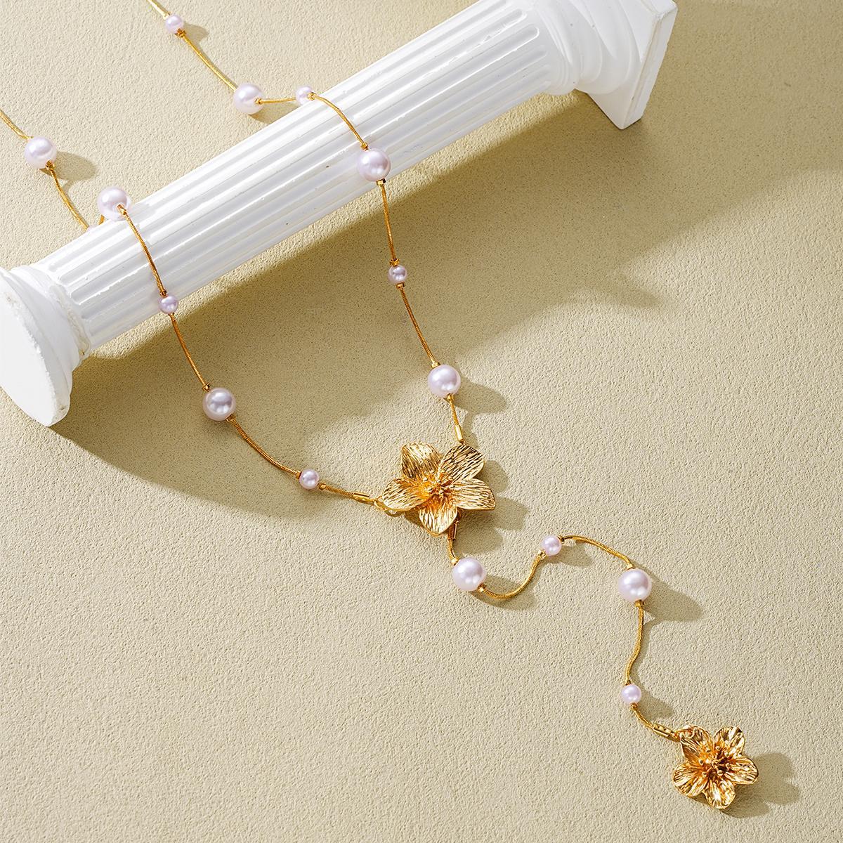 Damen Halskette mit floralen und perlenschmuck Akzenten Shop Nory