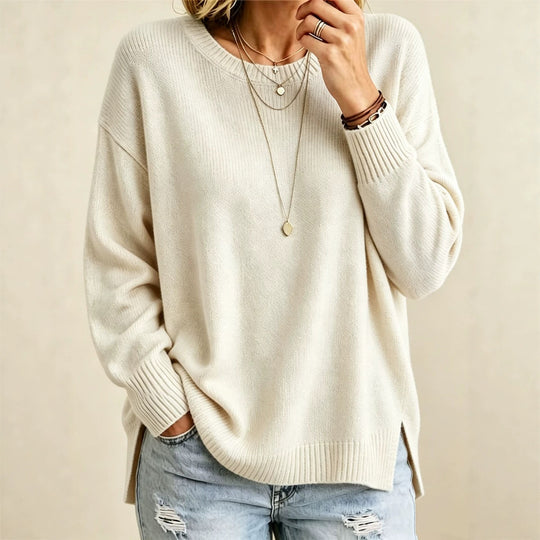 Damen Locker geschnittener Rundhals-Feinstrickpullover mit Seitenschlitzen und gerippten Bündchen Shop Nory