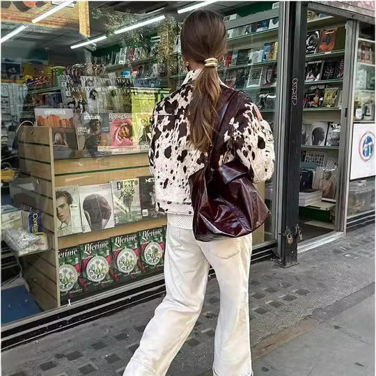 Damen Kurz geschnittene Western‑inspiriere Jacke mit Kuhflecken‑Felloptik und Brusttaschen Shop Nory
