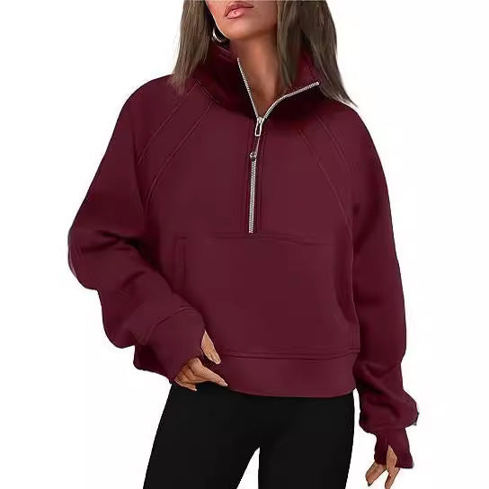 Damen sportlicher Hoodie mit kurzem Reißverschluss und praktischer Kängurutasche Shopnory