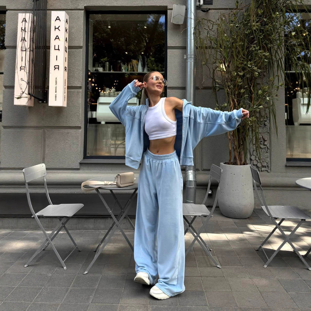 Damen sportive Oversize-Fleecejacke mit diagonaler Reißverschluss-Optik und weit geschnittener High-Waist-Jogginghose Shop Nory
