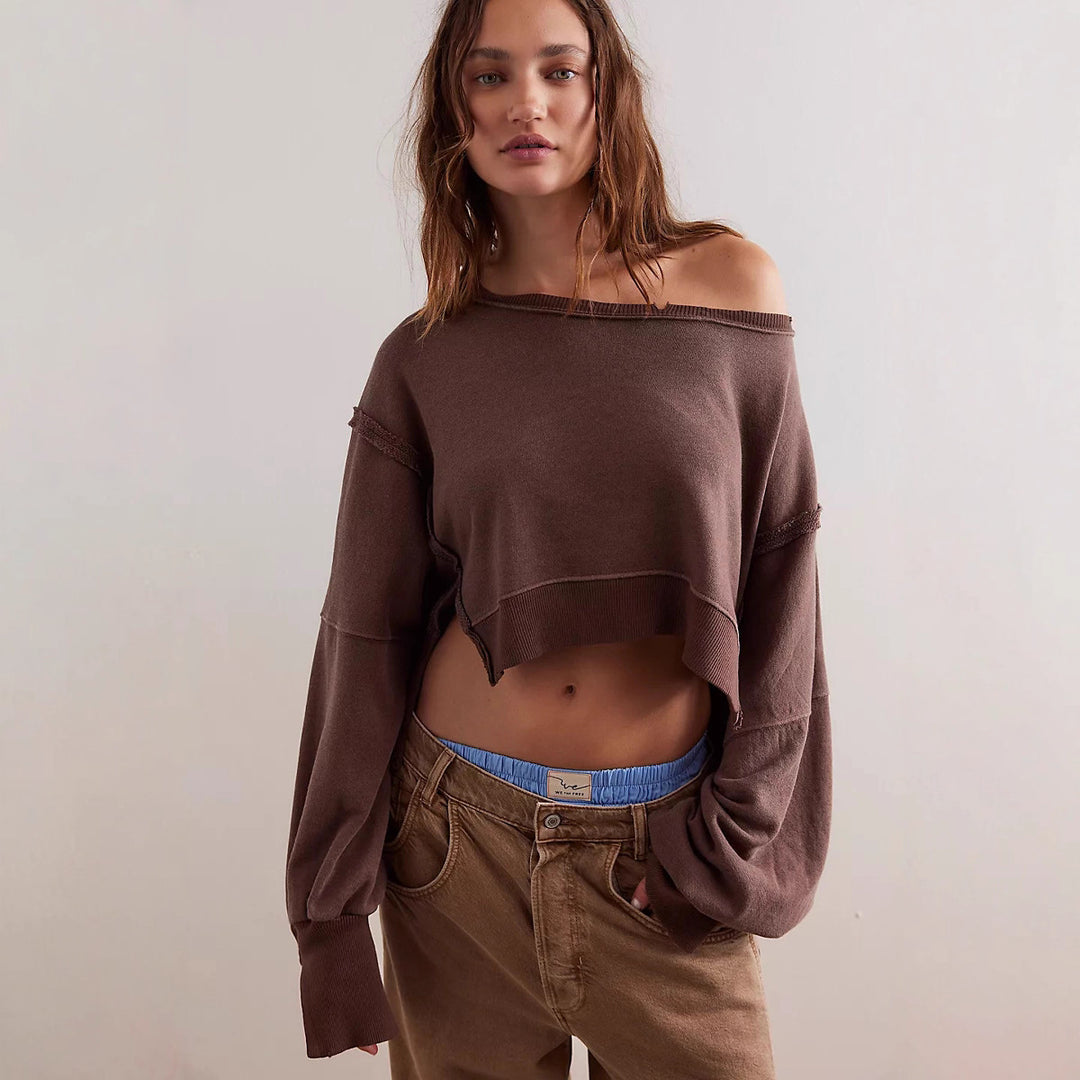 Damen cropped Oversize-Sweatshirt mit Daumenloch, fransigem Saum und weitem Raglanärmel Shop Nory