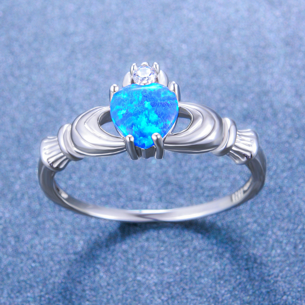 Damen Ring mit herzförmigem Opal und funkelnden Zirkonia-Elementen Shop Nory