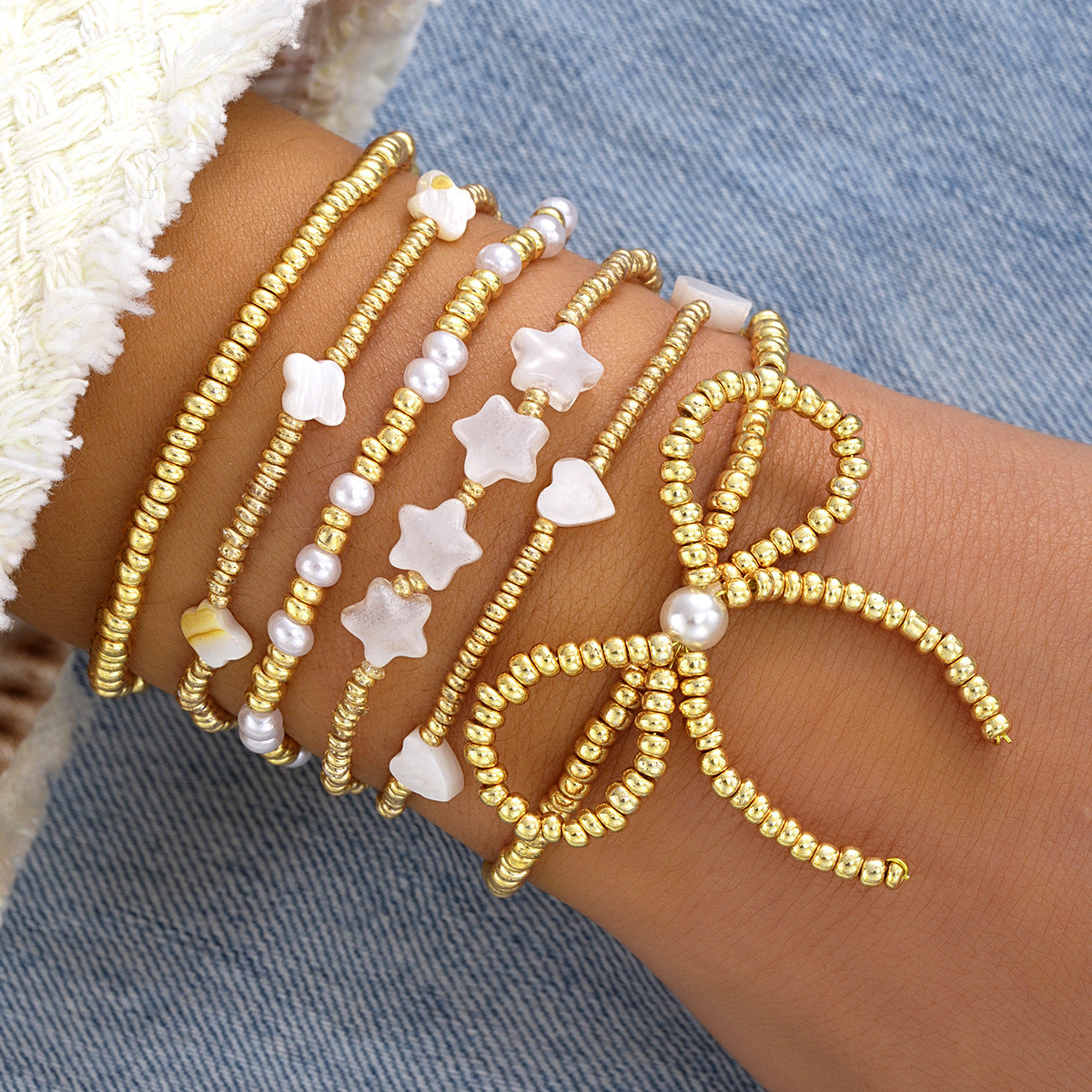 Damen Armreif-Set mit kreativen Perlen und zarten Sternenmotiven Shop Nory