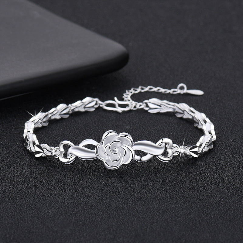Damenarmband mit kunstvollem Blumen-Design und funkelndem Zirkonia Shop Nory
