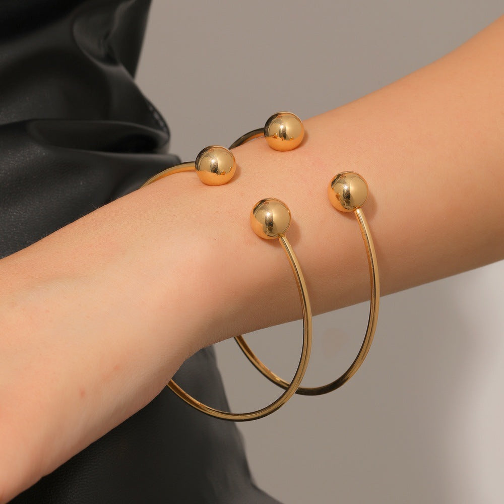 Damen Armspange mit modernem, geschwungenem Design Shop Nory