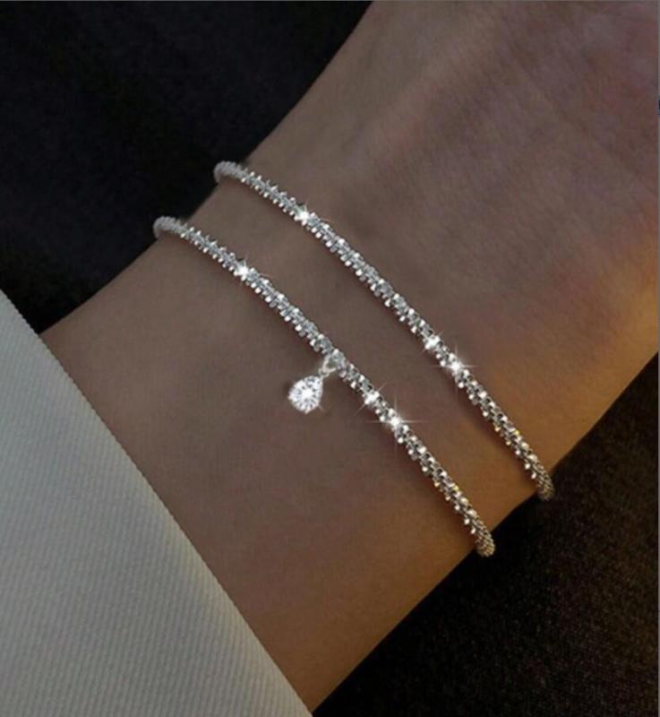 Damen Armreif-Set mit funkelnden Kristallen und zarten Gliederdesigns Shop Nory