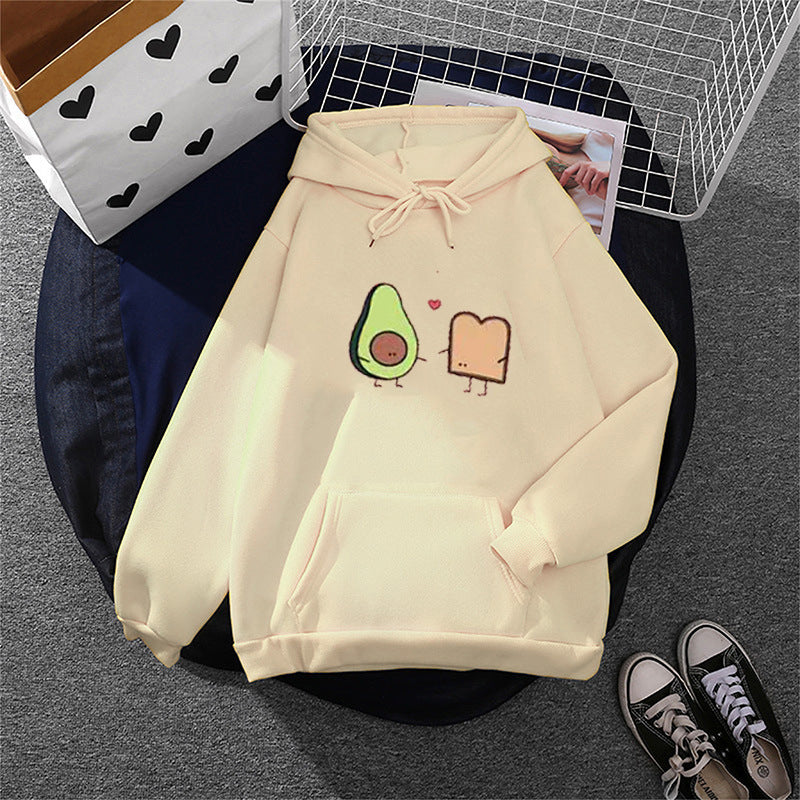 Damen nan gemütlicher Kapuzenpullover mit Avocado‑Toast-Illustration, weichem Fleece-Innenfutter und Kängurutasche Shop Nory