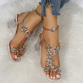 Damen Glamouröse Sandalen mit transparentem Blockabsatz und floralen Akzenten Shopnory
