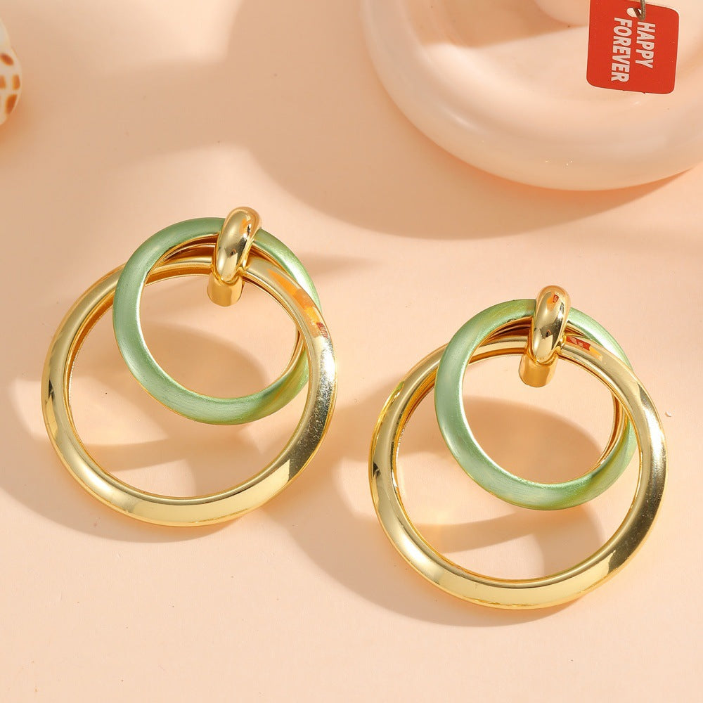 Damen Ohrringe mit elegantem, überlagertem Ringdesign Shop Nory