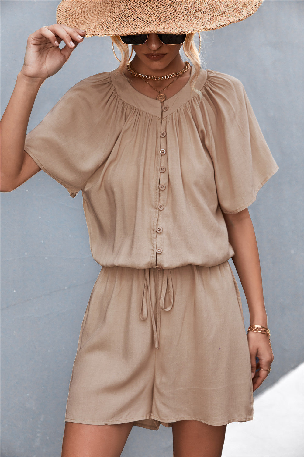 Damen Jumpsuit mit elastischem Bund und knopfverzierter Front